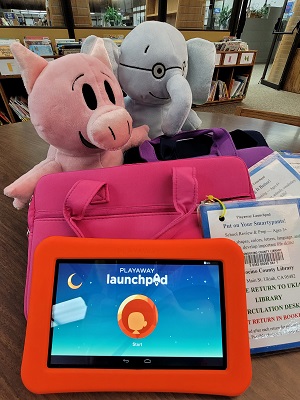 orange playaway launchpad with a pig and elephant stuffed animal