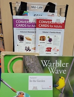 Memory kit with paint with water book, large type bird book, maze toy and conversation cards for adults