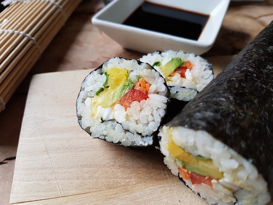 sushi roll with soy sauce dish