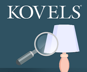 Kovels grapic with lamp and magnifying glass.