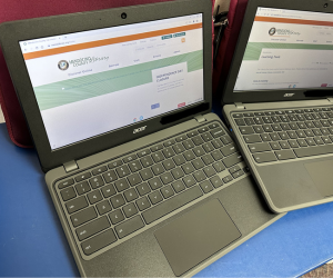 photo of two open Chromebook laptops