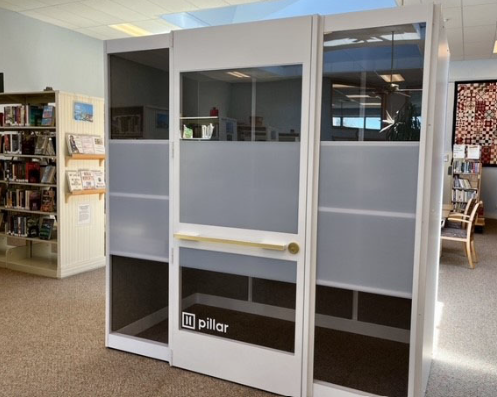 Enclosed study booth with glass door at Coast Branch Library.