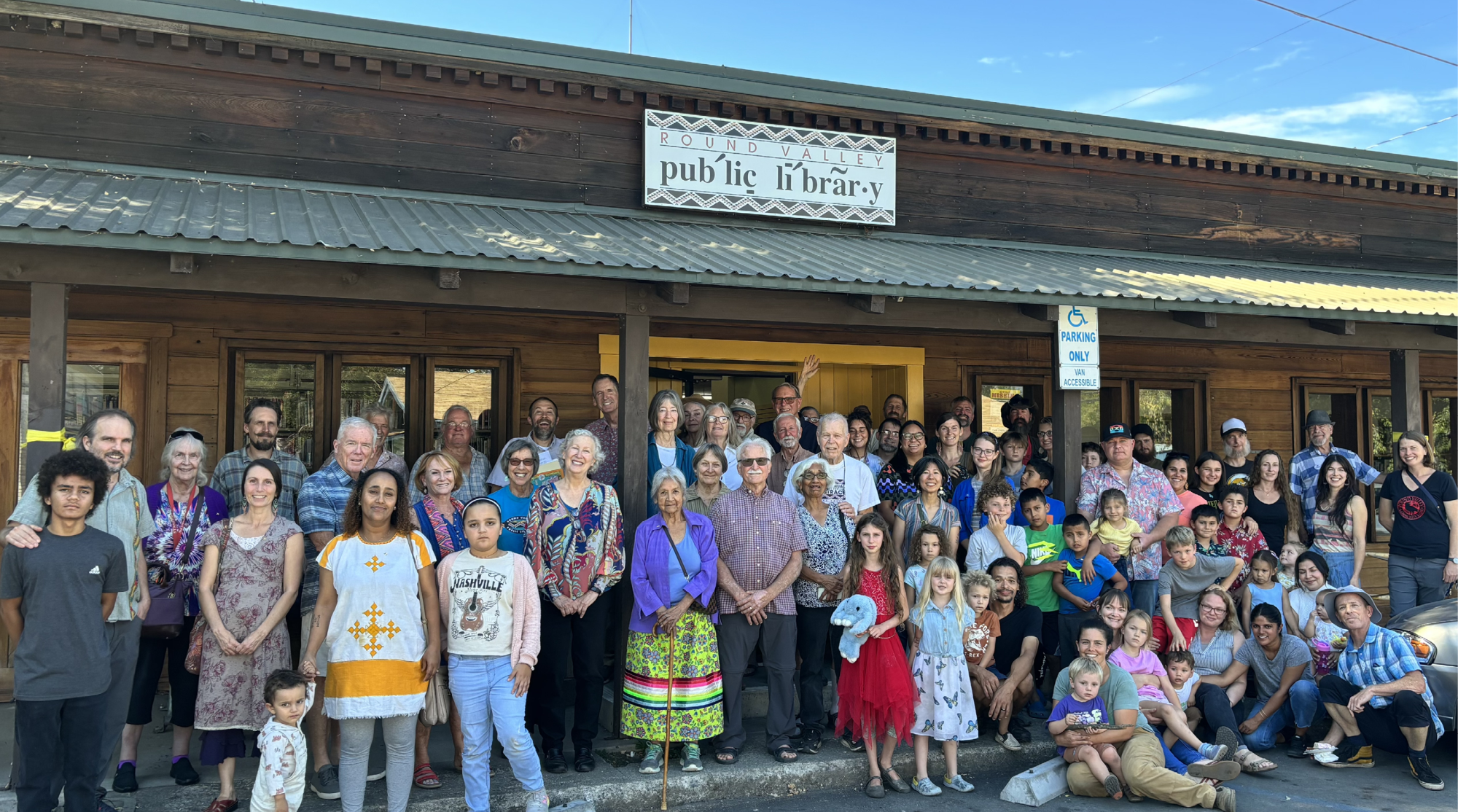 People outside the Round Valley Branch celebrating the Best Small Library in America 2024 award.