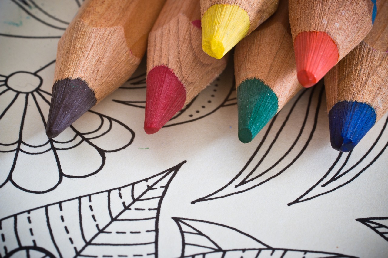 Photograph of a coloring page and colored pencils