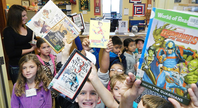 Children with books at Fort Bragg Library